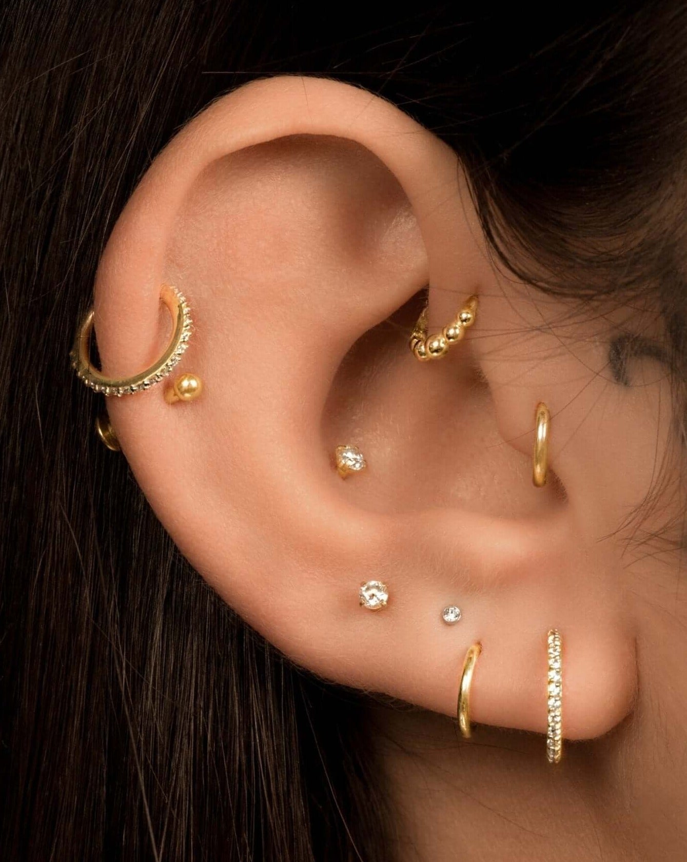 14k Gold Tiny Beaded Huggie Earrings in 6mm | Assolari